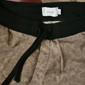 Coach shirt, sweater & sweat pants all size large.